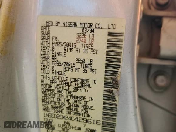 2004 Nissan Frontier XE with VIN 1N6ED29X24C429616, listed as a Copart auction lot 57605075 with 214,815 mi miles and Salvage title. Bid and sale history available at DreamBid. Image 12.