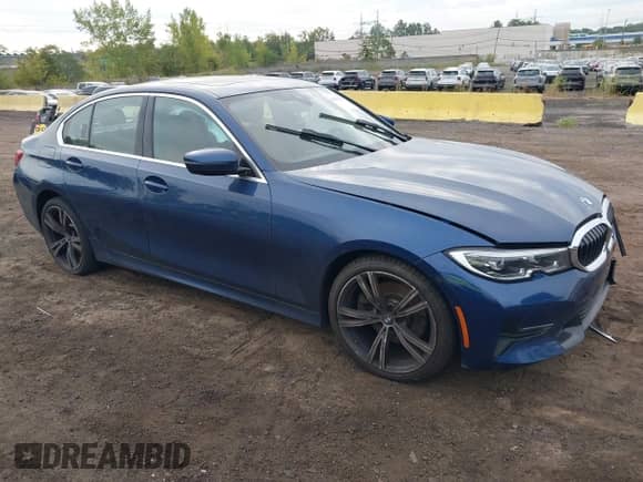 2022 BMW 3 Series 330i with VIN 3MW5R1J02N8C29404, listed as a IAAI auction lot 43203814 with 39,029 mi miles and . Bid and sale history available at DreamBid. Image 1.