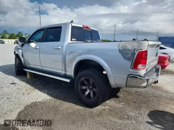 2015 Ram 1500 Laramie Longhorn с VIN 1C6RR7PM4FS698535, выставлен на аукционе Copart как лот 63283915 с пробегом 188 454 миль миль и Списание • Salvage title. История ставок и продаж доступна на DreamBid. Изображение 2.