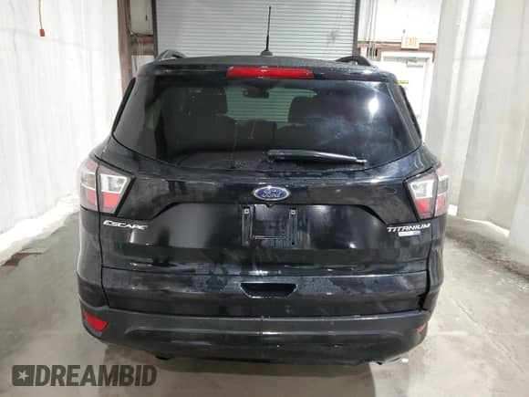 2017 Ford Escape Titanium с VIN 1FMCU9JD2HUD17267, выставлен на аукционе Copart как лот 86828485 с пробегом 72 989 миль миль и Списание • Salvage title. История ставок и продаж доступна на DreamBid. Изображение 6.