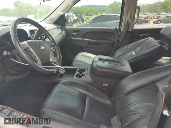 2012 Chevrolet Tahoe LS with VIN 1GNSCAE04CR258690, listed as a Copart auction lot 55443185 with 127,488 mi miles and Salvage title. Bid and sale history available at DreamBid. Image 7.