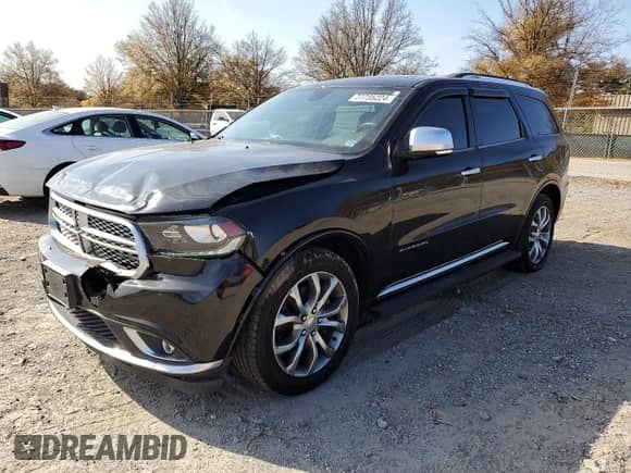 2016 Dodge Durango Citadel Anodized Platinum with VIN 1C4SDJET3GC420012, listed as a Copart auction lot 77735224 with 108,015 mi miles and Salvage title. Bid and sale history available at DreamBid. Image 1.