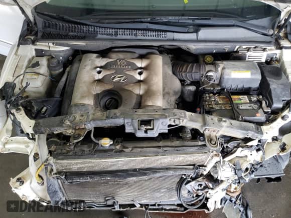 2007 Hyundai Entourage GLS with VIN KNDMC233876027514, listed as a Copart auction lot 69425454 with 230,506 mi miles and Salvage title. Bid and sale history available at DreamBid. Image 12.