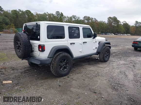2021 Jeep Wrangler Unlimited Willys with VIN 1C4HJXDN0MW685716, listed as a IAAI auction lot 40837088 with 35,881 mi miles and . Bid and sale history available at DreamBid. Image 4.