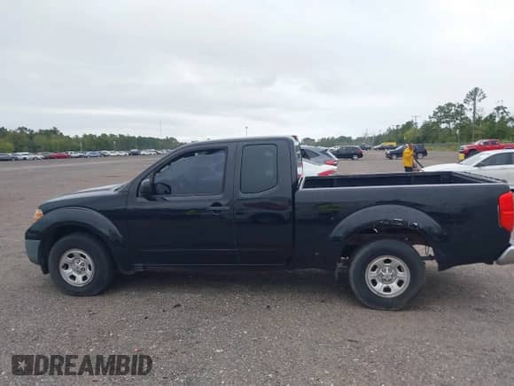 2015 Nissan Frontier S with VIN 1N6BD0CT4FN721160, listed as a IAAI auction lot 43370002 with 143,025 mi miles and . Bid and sale history available at DreamBid. Image 14.