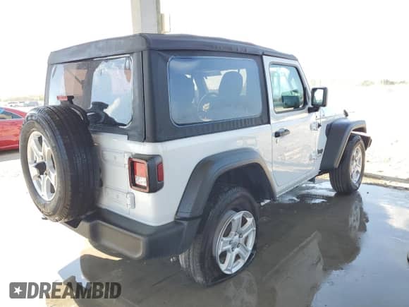 2023 Jeep Wrangler Sport with VIN 1C4GJXAN9PW592844, listed as a Copart auction lot 56748874 with 11,639 mi miles and Salvage title. Bid and sale history available at DreamBid. Image 3.
