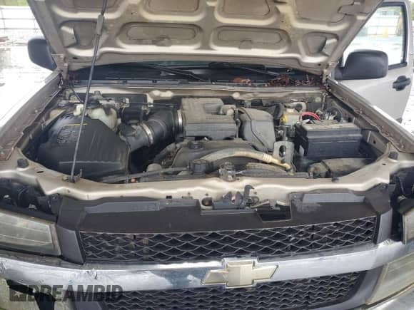 2006 Chevrolet Colorado 3LT z VIN 1GCDS136668257322, wystawiony jako Copart lot #71606414 z przebiegiem 241 862 mil mil oraz Szkoda całkowita • Salvage title. Historia ofert i sprzedaży dostępna na DreamBid. Obrazek 11.