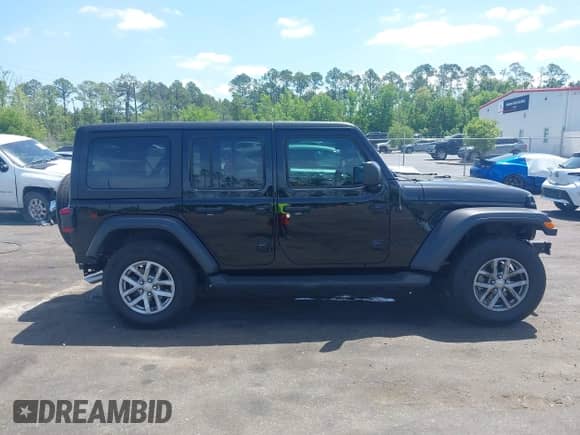 2023 Jeep Wrangler Sport S z VIN 1C4HJXDN5PW671167, wystawiony jako IAAI lot #42176127 z przebiegiem 1 230 mil mil oraz . Historia ofert i sprzedaży dostępna na DreamBid. Obrazek 14.