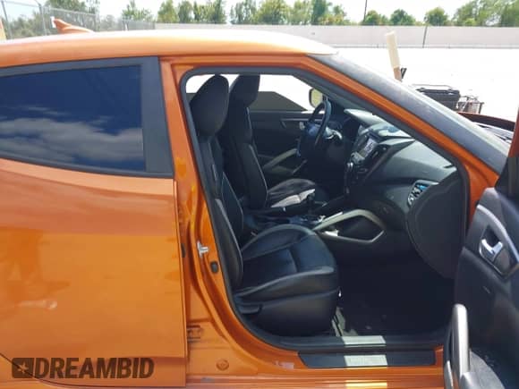 2013 Hyundai Veloster Turbo с VIN KMHTC6AE4DU169787, выставлен на аукционе IAAI как лот 43334701 с пробегом 114 117 миль миль и . История ставок и продаж доступна на DreamBid. Изображение 5.