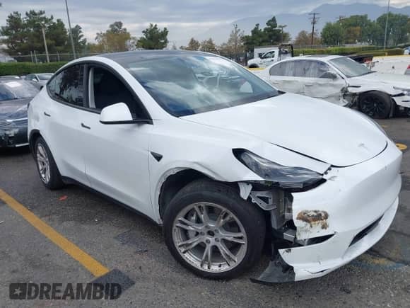 2023 Tesla Model Y Long Range with VIN 7SAYGAEE2PF763662, listed as a IAAI auction lot 43412618 with 43,857 mi miles and . Bid and sale history available at DreamBid. Image 1.