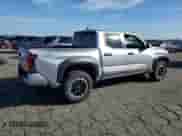 2024 Toyota Tacoma TRD Off Road with VIN 3TMLB5JN8RM000837, listed as a Copart auction lot 82183745 with 14,184 mi miles and Salvage title. Bid and sale history available at DreamBid. Image 3.