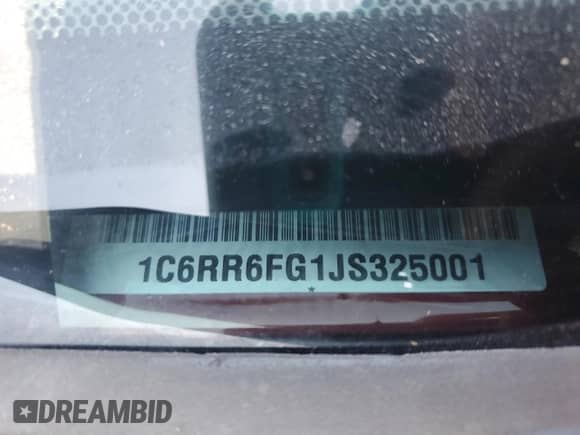 2018 Ram 1500 Tradesman z VIN 1C6RR6FG1JS325001, wystawiony jako Copart lot #80193395 z przebiegiem 100 575 mil mil oraz Szkoda całkowita • Salvage title. Historia ofert i sprzedaży dostępna na DreamBid. Obrazek 12.