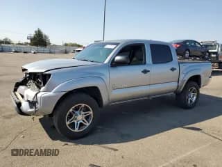 2014 Toyota Tacoma PreRunner z VIN 3TMJU4GNXEM171943, wystawiony jako Copart lot #80707815 z przebiegiem 129 164 mil mil oraz Szkoda całkowita • Salvage title. Historia ofert i sprzedaży dostępna na DreamBid. Obrazek 1.