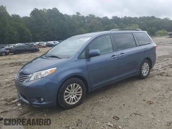 2016 Toyota Sienna XLE with VIN 5TDYK3DC9GS751673, listed as a Copart auction lot 69256525 with 81,113 mi miles and Salvage title. Bid and sale history available at DreamBid. Image 1.