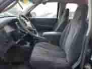 2002 Dodge Dakota с VIN 1B7GL12X52S669183, выставлен на аукционе Copart как лот 89385785 с пробегом 115 026 миль миль и Списание • Salvage title. История ставок и продаж доступна на DreamBid. Изображение 7.