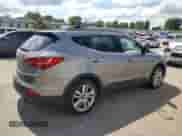 2016 Hyundai Santa Fe с VIN 5XYZW4LA2GG306509, выставлен на аукционе Copart как лот 70261325 с пробегом 131 880 миль миль и Списание • Salvage title. История ставок и продаж доступна на DreamBid. Изображение 3.