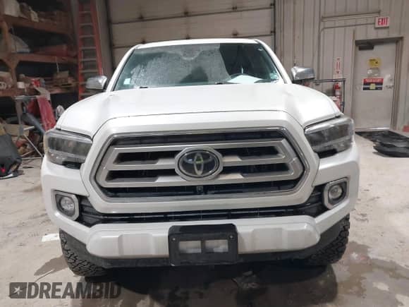2021 Toyota Tacoma Limited with VIN 3TYGZ5AN6MT029957, listed as a IAAI auction lot 41517557 with 55,673 mi miles and . Bid and sale history available at DreamBid. Image 12.