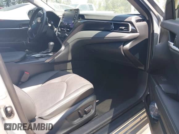 2023 Toyota Camry Hybrid XSE с VIN 4T1K31AK0PU617886, выставлен на аукционе IAAI как лот 42784356 с пробегом 56 946 миль миль и . История ставок и продаж доступна на DreamBid. Изображение 5.
