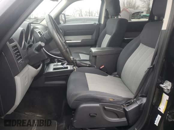 2010 Dodge Nitro SXT with VIN 1D4PT5GK8AW113559, listed as a Copart auction lot 44339295 with 217,829 mi miles and Salvage title. Bid and sale history available at DreamBid. Image 7.