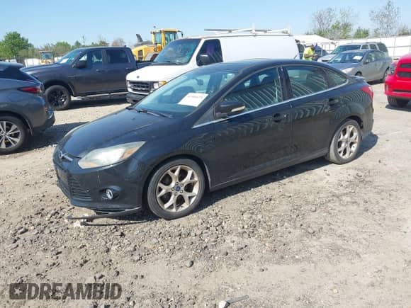 2014 Ford Focus Titanium with VIN 1FADP3J27EL227311, listed as a IAAI auction lot 41904675 with 180,459 mi miles and . Bid and sale history available at DreamBid. Image 2.