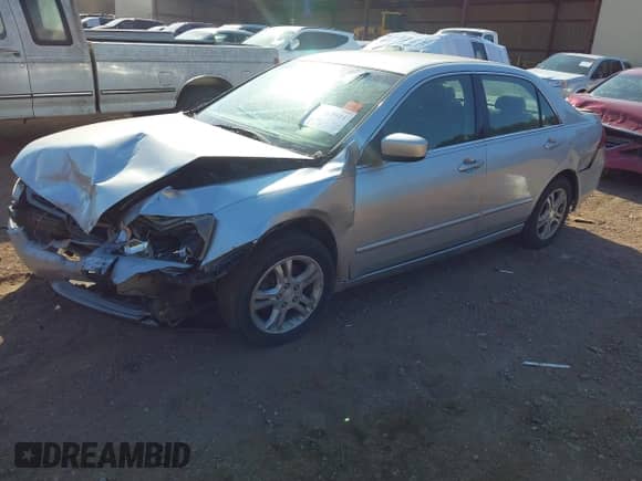 2007 Honda Accord LX SE with VIN JHMCM563X7C021672, listed as a IAAI auction lot 43163924 with 217,262 mi miles and . Bid and sale history available at DreamBid. Image 2.