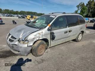 2002 Dodge Caravan SE with VIN 1B4GP25342B513054, listed as a Copart auction lot 71447165 with 318,100 mi miles and Salvage title. Bid and sale history available at DreamBid. Image 1.