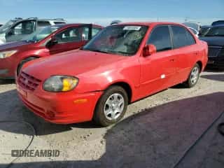 2005 Hyundai Accent GLS с VIN KMHCG45C15U596671, выставлен на аукционе Copart как лот 74834004 с пробегом Не указан миль и Списание • Salvage title. История ставок и продаж доступна на DreamBid. Изображение 1.