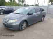 2012 Honda Odyssey EX z VIN 5FNRL5H40CB083650, wystawiony jako IAAI lot #43283741 z przebiegiem 164 693 mil mil oraz . Historia ofert i sprzedaży dostępna na DreamBid. Obrazek 2.