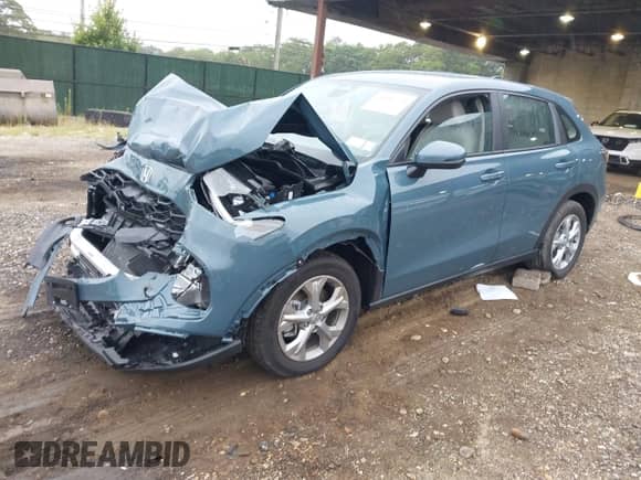 2025 Honda HR-V LX with VIN 3CZRZ2H39SM797074, listed as a IAAI auction lot 43042773 with 2,450 mi miles and . Bid and sale history available at DreamBid. Image 18.