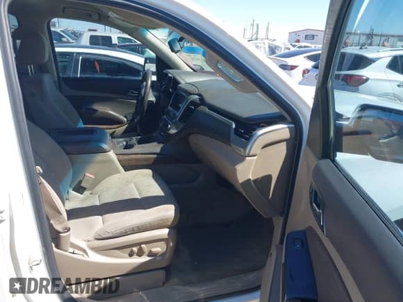 2015 Chevrolet Tahoe LS with VIN 1GNSCAKC5FR119378, listed as a IAAI auction lot 41759734 with Not provided miles and . Bid and sale history available at DreamBid. Image 5.