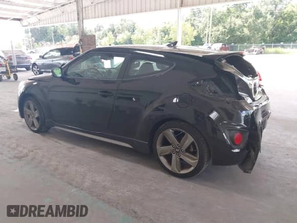 2013 Hyundai Veloster Turbo с VIN KMHTC6AEXDU167848, выставлен на аукционе IAAI как лот 43353403 с пробегом 84 077 миль миль и . История ставок и продаж доступна на DreamBid. Изображение 3.