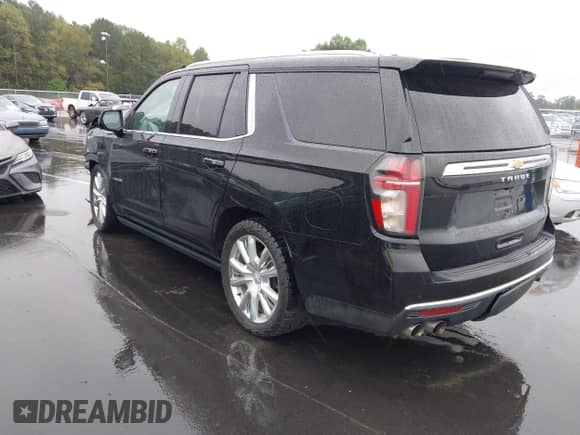 2021 Chevrolet Tahoe High Country with VIN 1GNSKTKL2MR155301, listed as a IAAI auction lot 43317582 with 90,141 mi miles and . Bid and sale history available at DreamBid. Image 3.