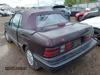 1991 Dodge Shadow with VIN 3B3XP45K5MT615827, listed as a IAAI auction lot 42157848 with 70,501 mi miles and . Bid and sale history available at DreamBid. Image 3.