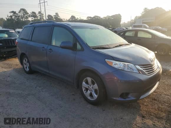 2015 Toyota Sienna LE with VIN 5TDKK3DC7FS647056, listed as a Copart auction lot 71981905 with 104,576 mi miles and Salvage title. Bid and sale history available at DreamBid. Image 4.