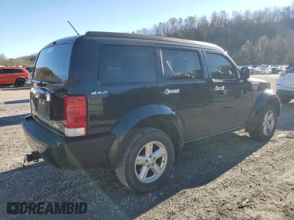 2011 Dodge Nitro SXT z VIN 1D4PU5GK5BW575754, wystawiony jako Copart lot #79841234 z przebiegiem 246 589 mil mil oraz Szkoda całkowita • Salvage title. Historia ofert i sprzedaży dostępna na DreamBid. Obrazek 3.