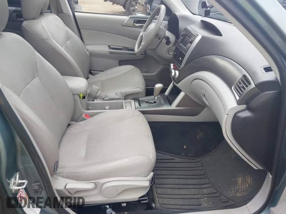 2012 Subaru Forester X Limited z VIN JF2SHAEC9CH422804, wystawiony jako IAAI lot #42892881 z przebiegiem 141 716 mil mil oraz . Historia ofert i sprzedaży dostępna na DreamBid. Obrazek 5.