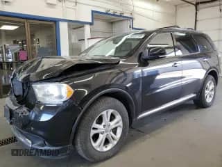 2013 Dodge Durango Crew with VIN 1C4SDJDT1DC509543, listed as a Copart auction lot 80838195 with 136,406 mi miles and Salvage title. Bid and sale history available at DreamBid. Image 1.