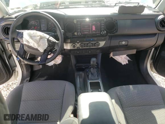 2021 Toyota Tacoma SR z VIN 5TFCZ5AN7MX267045, wystawiony jako Copart lot #65592105 z przebiegiem 40 992 mil mil oraz Szkoda całkowita • Salvage title. Historia ofert i sprzedaży dostępna na DreamBid. Obrazek 8.