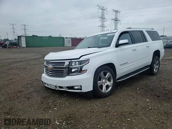 2020 Chevrolet Suburban Premier с VIN 1GNSKJKC1LR189099, выставлен на аукционе Copart как лот 57774365 с пробегом Не указан миль и Списание • Salvage title. История ставок и продаж доступна на DreamBid. Изображение 14.