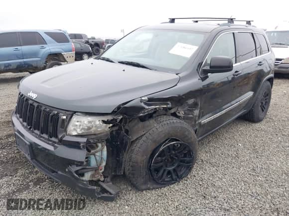 2012 Jeep Grand Cherokee Laredo z VIN 1C4RJFAG0CC293775, wystawiony jako IAAI lot #43186102 z przebiegiem 174 699 mil mil oraz . Historia ofert i sprzedaży dostępna na DreamBid. Obrazek 17.