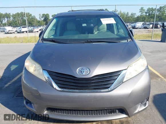 2011 Toyota Sienna LE with VIN 5TDJK3DC5BS019471, listed as a IAAI auction lot 43121145 with 214,140 mi miles and . Bid and sale history available at DreamBid. Image 6.