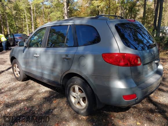 2007 Hyundai Santa Fe GLS z VIN 5NMSG73D17H034812, wystawiony jako IAAI lot #43472040 z przebiegiem 229 218 mil mil oraz . Historia ofert i sprzedaży dostępna na DreamBid. Obrazek 3.