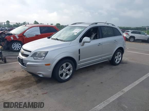 2015 Chevrolet Captiva Sport LTZ with VIN 3GNAL4EKXFS522575, listed as a IAAI auction lot 42691610 with 144,144 mi miles and . Bid and sale history available at DreamBid. Image 2.