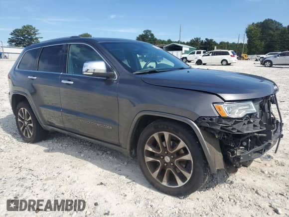 2017 Jeep Grand Cherokee Overland with VIN 1C4RJFCG9HC800659, listed as a Copart auction lot 67804285 with 105,483 mi miles and Salvage title. Bid and sale history available at DreamBid. Image 4.