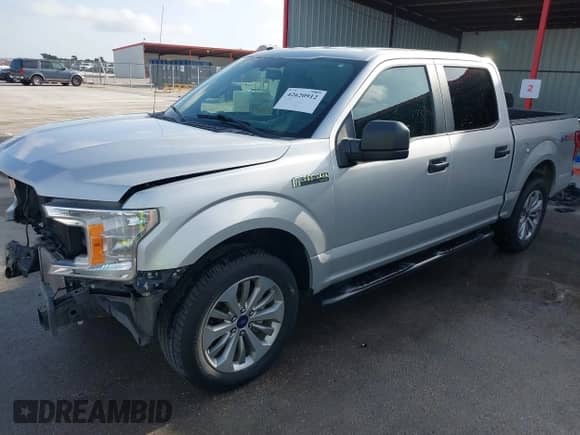 2018 Ford F-150 XL with VIN 1FTEW1CP8JKC70201, listed as a IAAI auction lot 42620912 with 124,499 mi miles and . Bid and sale history available at DreamBid. Image 19.