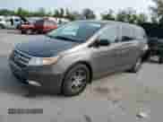 2013 Honda Odyssey EX-L с VIN 5FNRL5H65DB065311, выставлен на аукционе Copart как лот 81468745 с пробегом 188 718 миль миль и Списание • Salvage title. История ставок и продаж доступна на DreamBid. Изображение 1.