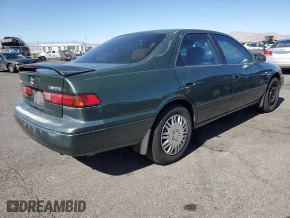 1999 Toyota Camry LE z VIN JT2BG28KXX0359137, wystawiony jako Copart lot #85011045 z przebiegiem 158 951 mil mil oraz Czysty tytuł • Clean title. Historia ofert i sprzedaży dostępna na DreamBid. Obrazek 3.