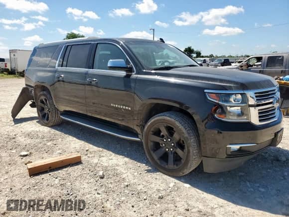2017 Chevrolet Suburban Premier с VIN 1GNSKJKC7HR316042, выставлен на аукционе Copart как лот 65912715 с пробегом 98 027 миль миль и Списание • Salvage title. История ставок и продаж доступна на DreamBid. Изображение 4.