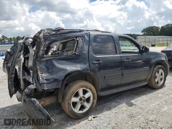 2013 Chevrolet Tahoe LT с VIN 1GNSKBE01DR267244, выставлен на аукционе Copart как лот 69544125 с пробегом 193 184 миль миль и Списание • Salvage title. История ставок и продаж доступна на DreamBid. Изображение 3.