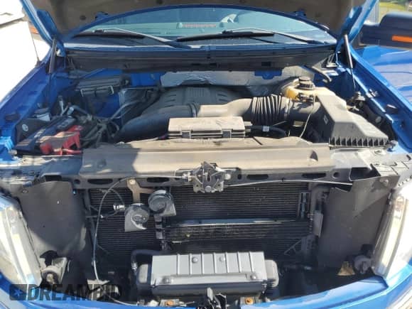 2013 Ford F-150 XL z VIN 1FTFW1CT1DFA87057, wystawiony jako Copart lot #67962955 z przebiegiem 66 452 mil mil oraz Szkoda całkowita • Salvage title. Historia ofert i sprzedaży dostępna na DreamBid. Obrazek 11.